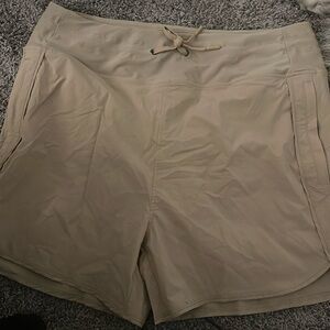 Tan swim shorts